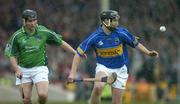 21 May 2005; Philip Maher, Tipperary, in action against TJ Ryan, Limerick. Guinness Munster Senior Hurling Championship Quarter-Final Replay, Limerick v Tipperary, Gaelic Grounds, Limerick. Picture credit; Brendan Moran / SPORTSFILE