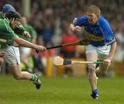 21 May 2005; Ger O'Grady, Tipperary, in action against Ollie Moran, Limerick. Guinness Munster Senior Hurling Championship Quarter-Final Replay, Limerick v Tipperary, Gaelic Grounds, Limerick. Picture credit; Brendan Moran / SPORTSFILE