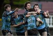 28 January 2014; John Fox, 13, Castletroy, is congratulated by team-mates after scoring his side's third try. SEAT Munster Schools Senior Cup, 1st Round, Rockwell College v Castletroy College, Clanwilliam Park, Tipperary Town. Picture credit: Diarmuid Greene / SPORTSFILE