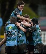 28 January 2014; John Fox, 13, Castletroy, is congratulated by team-mates after scoring his side's third try. SEAT Munster Schools Senior Cup, 1st Round, Rockwell College v Castletroy College, Clanwilliam Park, Tipperary Town. Picture credit: Diarmuid Greene / SPORTSFILE