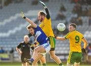 2 February 2014; Ross Munnelly, Laois, in action against Karl Lacy, Donegal. Allianz Football League, Division 2, Round 1, Laois v Donegal, O'Moore Park, Portlaoise, Co. Laois. Picture credit: Barry Cregg / SPORTSFILE