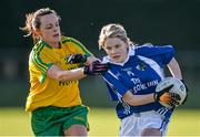 2 February 2014; Caoimhe Simms, Laois, in action against Orla Carr, Donegal. Tesco HomeGrown Ladies Football National League Division 1, Laois v Donegal. Crettyard, Co. Laois. Picture credit: Ramsey Cardy / SPORTSFILE