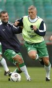 3 June 2005; Graham Kavanagh, Republic of Ireland, in action against his team-mate Roy Keane during squad training. Lansdowne Road, Dublin. Picture credit; David Maher / SPORTSFILE