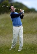 4 June 2005; Mark Campbell, watches his shot from the first fairway during the East of Ireland Amateur Open Championship 2005. Co. Louth Golf Club, Baltray, Co. Louth. Picture credit; Damien Eagers / SPORTSFILE