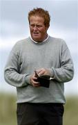 4 June 2005; Darren Crowe, Dunmurray, checks the yardage before teeing off on the 5th during the East of Ireland Amateur Open Championship 2005. Co. Louth Golf Club, Baltray, Co. Louth. Picture credit; Damien Eagers / SPORTSFILE