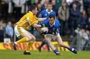 4 June 2005; Martin Cahill, Cavan, in action against Shane Delvin, Antrim. Bank of Ireland Ulster Senior Football Championship Replay, Antrim v Cavan, Casement Park, Belfast. Picture credit; Pat Murphy / SPORTSFILE