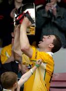 5 June 2005; Antrim captain Jim Connolly pretends to drink from the Liam Harvey Cup. Guinness Ulster Senior Hurling Championship Final, Antrim v Down, Casement Park, Belfast. Picture credit; Pat Murphy / SPORTSFILE