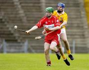 5 June 2005; Sean McNicholl, Derry, in action against Randal McDonnell, Antrim. Ulster Minor Hurling Championship Final, Antrim v Derry, Casement Park, Belfast. Picture credit; Pat Murphy / SPORTSFILE