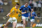 4 June 2005; Paul Doherty, Antrim, in action against Pierce McKenna, Cavan. Bank of Ireland Ulster Senior Football Championship Replay, Antrim v Cavan, Casement Park, Belfast. Picture credit; Pat Murphy / SPORTSFILE