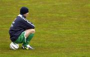 7 June 2005; Roy Keane, Republic of Ireland, takes a break during squad training. Torsvollur Stadium, Torshavn, Faroe Islands. Picture credit; Damien Eagers / SPORTSFILE