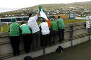 7 June 2005; Republic of Ireland supporters watch from a high vantage point during squad training. Torsvollur Stadium, Torshavn, Faroe Islands. Picture credit; David Maher / SPORTSFILE