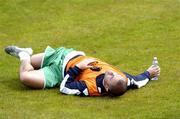 7 June 2005; Stephen Carr, Republic of Ireland, stretches during squad training. Torsvollur Stadium, Torshavn, Faroe Islands. Picture credit; Damien Eagers / SPORTSFILE