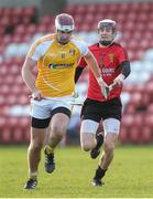 2 February 2014; Conor Carson, Antrim, in action against Donal Hughes, Down. 2013 Ulster GAA Senior Hurling Championship Final, Antrim v Down, Celtic Park, Derry. Picture credit: Philip Fitzpatrick / SPORTSFILE