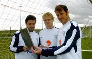 3 June 2005; Pictured are Irish soccer stars Andy Reid, Damien Duff, and Kenny Cunningham reading e wishes from the Irish fans using a wireless hotspot ahead of tomorrow's crunch world cup qualifier with Israel at Lansdowne Road. Tomorrow Lansdowne Road will become eircom's 300th wireless hotpspot. Malahide FC, Malahide, Dublin. Picture credit; Damien Eagers / SPORTSFILE
