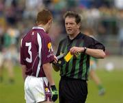 12 June 2005; Referee Michael Monahan shows the yellow card to Galway's Kevin Fitzgerald. Bank of Ireland Connacht Senior Football Championship Semi-Final, Galway v Leitrim, Pearse Stadium, Galway. Picture credit; Ray McManus / SPORTSFILE