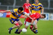 12 June 2005; John Hayes, Cork, in action against Mark O'Connell, Clare. Bank of Ireland Munster Senior Football Championship Semi-Final, Clare v Cork, Cusack Park, Ennis, Co. Clare. Picture credit; Kieran Clancy / SPORTSFILE