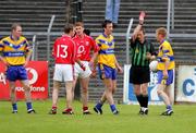 12 June 2005; Referee Pat Fox sends off Ronan Slattery, right, Clare. Bank of Ireland Munster Senior Football Championship Semi-Final, Clare v Cork, Cusack Park, Ennis, Co. Clare. Picture credit; Kieran Clancy / SPORTSFILE