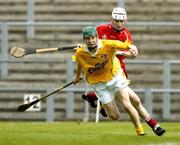 5 June 2005; Paul Shields, Antrim, in action against Padraig McKenna, Derry. Ulster Minor Hurling Championship Final, Antrim v Derry, Casement Park, Belfast. Picture credit; Pat Murphy / SPORTSFILE