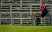 5 June 2005; A young Down supporter watches the game. Guinness Ulster Senior Hurling Championship Final, Antrim v Down, Casement Park, Belfast. Picture credit; Pat Murphy / SPORTSFILE