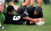 27 March 1999; Brian Hogan, no 9, assisted by team-mate Kenny Wheelock, right, scores a try during the AIB All-Ireland League Division 2 match between De La Salle Palmerstown RFC v City of Derry RFC at Kirwan Park in Kiltiernan, Dublin. Photo by Aoife Rice/Sportsfile