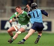 4 April 1999; Ciaran Carey of Limerick tackles Liam Ryan of Dublin during the Church and General National Hurling League Division 1A match between Dublin and Limerick at Parnell Park in Dublin. Photo by Ray McManus/Sportsfile