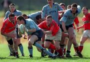 3 April 1999; Ciaran Scally of UCD is tackled by Aidan O'Gorman of Bohemians during the AIB All-Ireland League Division 3 match between UCD RFC and Bohemians RFC at the Belfield Bowl in Dublin. Photo by Ray McManus/Sportsfile