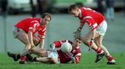 14 February 1999; Niall Finnegan of Galway in action against Ronan McCarthy, left, and Donagh Wiseman of Cork during the Allianz National Football League Division 1 match between Cork and Galway at Páirc Uí Rinn in Cork. Photo by Brendan Moran/Sportsfile