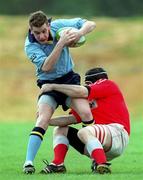 3 April 1999; Philip Bredin of UCD is tackled by Ian Dillon of Bohemians during the AIB All-Ireland League Division 3 match between UCD RFC and Bohemians RFC at the Belfield Bowl in Dublin. Photo by Ray McManus/Sportsfile