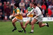 6 April 1997; Roy Malone of Offaly in action against John Finn of Kildare during the Church and General National Football League Quarter-Final match between Offaly and Kildare at Páirc Tailteann in Navan, Meath. Photo by Ray McManus/Sportsfile