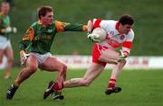 28 February 1999; Ruairi Boylan of Derry in action against Darren Fay of Meath during the Church and General National Football League Division 1 match between Meath and Derry at Páirc Tailteann in Navan, Meath. Photo by Ray McManus/Sportsfile