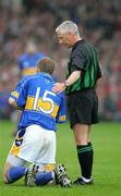 5 June 2005; Referee Pat O'Connor attends to Tipperary's Lar Corbett. Guinness Munster Senior Hurling Championship Semi-Final, Clare v Tipperary, Gaelic Grounds, Limerick. Picture credit; Kieran Clancy / SPORTSFILE