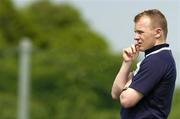 14 June 2005; Assistant coach Mark McCall watches the players during training. Ireland rugby squad training, Tatsumi No Mori Rugby training facility, Tokyo, Japan. Picture credit; Brendan Moran / SPORTSFILE