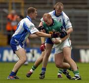 18 June 2005; Senan Hehir, London, in action against Eoin Lennon, left, and Dick Clerkin, Monaghan. Bank of Ireland All-Ireland Senior Football Championship Qualifier, Round 1, Monaghan v London, St. Tighernach's Park, Clones, Co. Monaghan. Picture credit; Pat Murphy / SPORTSFILE
