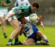 18 June 2005; Paul Finlay, Monaghan, in action against Damien McKenna, London. Bank of Ireland All-Ireland Senior Football Championship Qualifier, Round 1, Monaghan v London, St. Tighernach's Park, Clones, Co. Monaghan. Picture credit; Pat Murphy / SPORTSFILE