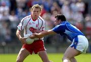 19 June 2005; Owen Mulligan, Tyrone, in action against Peter Reilly, Cavan. Bank of Ireland Ulster Senior Football Championship Semi-Final, Tyrone v Cavan, St. Tighernach's Park, Clones, Co. Monaghan. Picture credit; Pat Murphy / SPORTSFILE