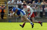 19 June 2005; Mark McKeever, Cavan, in action against Davy Harte, Tyrone. Bank of Ireland Ulster Senior Football Championship Semi-Final, Tyrone v Cavan, St. Tighernach's Park, Clones, Co. Monaghan. Picture credit; Pat Murphy / SPORTSFILE