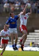 19 June 2005; Martin Penrose, Tyrone, in action against Martin Cahill, Cavan. Bank of Ireland Ulster Senior Football Championship Semi-Final, Tyrone v Cavan, St. Tighernach's Park, Clones, Co. Monaghan. Picture credit; Pat Murphy / SPORTSFILE