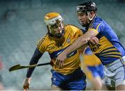 7 February 2014; Conor McGrath, Clare, in action against Conor O'Mahony, Tipperary. Waterford Crystal Cup Final, Clare v Tipperary,  Gaelic Grounds, Limerick. Photo by Sportsfile