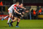 7 February 2014; Ashley Beck, Ospreys, is tackled by Tom Court, left, and Ruan Pienaar, Ulster, Celtic League 2013/14, Round 13, Ulster v Ospreys, Ravenhill Park, Belfast, Co. Antrim. Picture credit: Russell Pritchard / SPORTSFILE