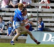 19 June 2005; Martin Penrose, Tyrone, in action against Pauric Reilly, Cavan. Bank of Ireland Ulster Senior Football Championship Semi-Final, Tyrone v Cavan, St. Tighernach's Park, Clones, Co. Monaghan. Picture credit; Pat Murphy / SPORTSFILE