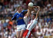 19 June 2005; Pierce McKenna, Cavan, in action against Shane Sweeney and Conor Gormley, left, Tyrone. Bank of Ireland Ulster Senior Football Championship Semi-Final, Tyrone v Cavan, St. Tighernach's Park, Clones, Co. Monaghan. Picture credit; Pat Murphy / SPORTSFILE