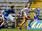 19 June 2005; Peter Canavan, Tyrone, gets away from the challenge of Keith Fannin, Cavan. Bank of Ireland Ulster Senior Football Championship Semi-Final, Tyrone v Cavan, St. Tighernach's Park, Clones, Co. Monaghan. Picture credit; Pat Murphy / SPORTSFILE