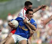 19 June 2005; Paul Brady, Cavan, in action against Brendan Donnelly, Tyrone. Bank of Ireland Ulster Senior Football Championship Semi-Final, Tyrone v Cavan, St. Tighernach's Park, Clones, Co. Monaghan. Picture credit; Oliver McVeigh / SPORTSFILE