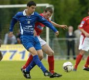 24 June 2005; Vinnie Sullivan, Waterford United, in action against Jim Crawford, Shelbourne. eircom League, Premier Division, Waterford United v Shelbourne, Waterford RSC, Waterford. Picture credit; Matt Browne / SPORTSFILE