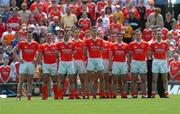 26 June 2005; Armagh team stand for the national anthem. Bank of Ireland Ulster Senior Football Championship Semi-Final, Armagh v Derry, Casement Park, Belfast. Picture Credit; David Maher / SPORTSFILE