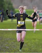 12 February 2014; Siofra Cleirigh Buttner, Col Iosagain, Co. Dublin, crosses the line to win the Senior Girls race at the Aviva Leinster Schools Cross Country Championships. Santry Demesne, Santry, Co. Dublin. Picture credit: Ramsey Cardy / SPORTSFILE