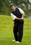 1 July 2005; Damien McGrane, Ireland, watches his pitch onto the 9th green during the second round of the Smurfit European Open. K Club, Straffan, Co. Kildare. Picture credit; Matt Browne / SPORTSFILE