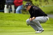 2 July 2005; Graeme Storm, England, lines up a putt on the 2nd green during the third round of the Smurfit European Open. K Club, Straffan, Co. Kildare. Picture credit; Damien Eagers / SPORTSFILE