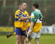 2 July 2005; Clare's Colin Lynch consoles Offaly's Michael Cordial at the end of the match. Guinness All-Ireland Senior Hurling Championship Qualifier, Round 2, Offaly v Clare, O'Moore Park, Portlaoise, Co. Laois. Picture credit; Damien Eagers / SPORTSFILE