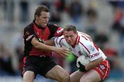 3 July 2005; Paul Murphy, Derry, in action against Rogers Ambrose, Down. Bank of Ireland All-Ireland Senior Football Championship Qualifier, Round 2, Down v Derry, Pairc An Iuir, Newry, Co. Down. Picture credit; David Maher / SPORTSFILE